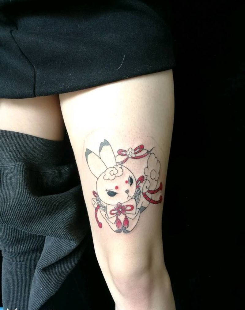 很喜庆的小兔子纹身图片_腿部水彩纹身图案