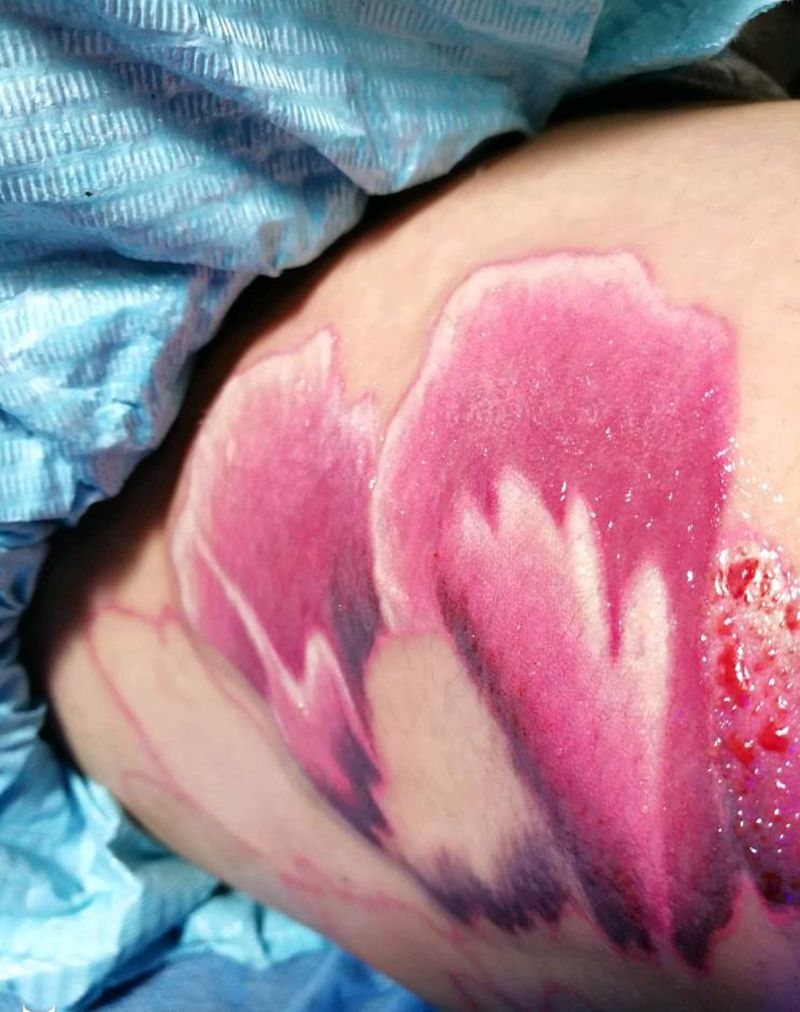 大腿牡丹纹身图片