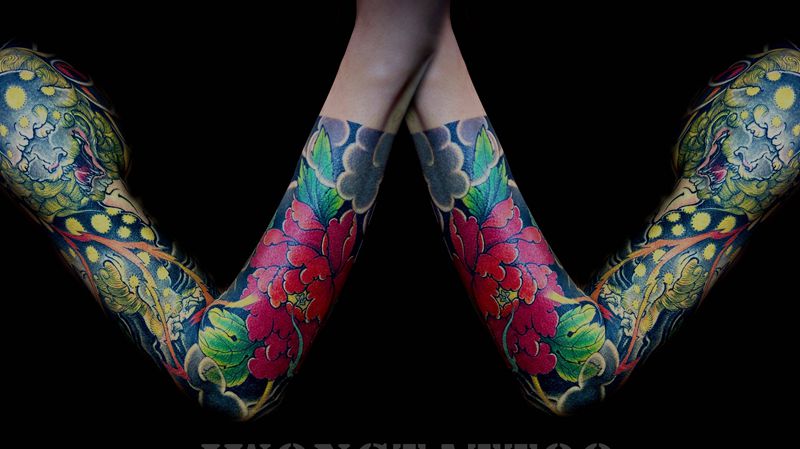 唐狮花臂纹身图片_手臂新传统纹身图案