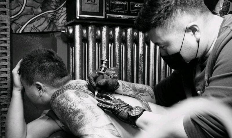 遮盖工作照纹身图片_宇刺青遮盖未完成纹身图案