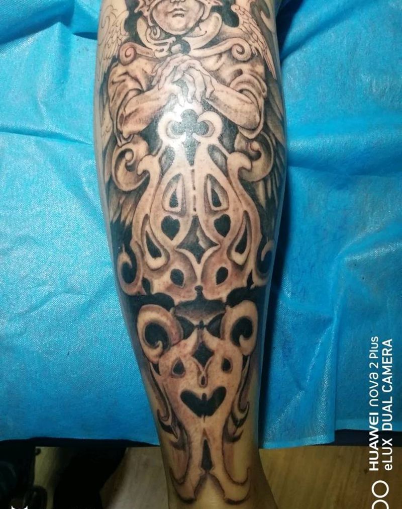 包小腿欧美写实纹身图片_腿部欧美写实纹身图案