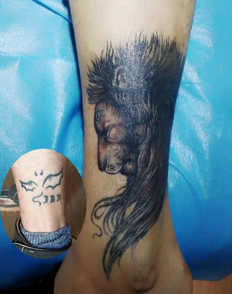 狮子遮盖纹身图片_欧美动物纹身图案
