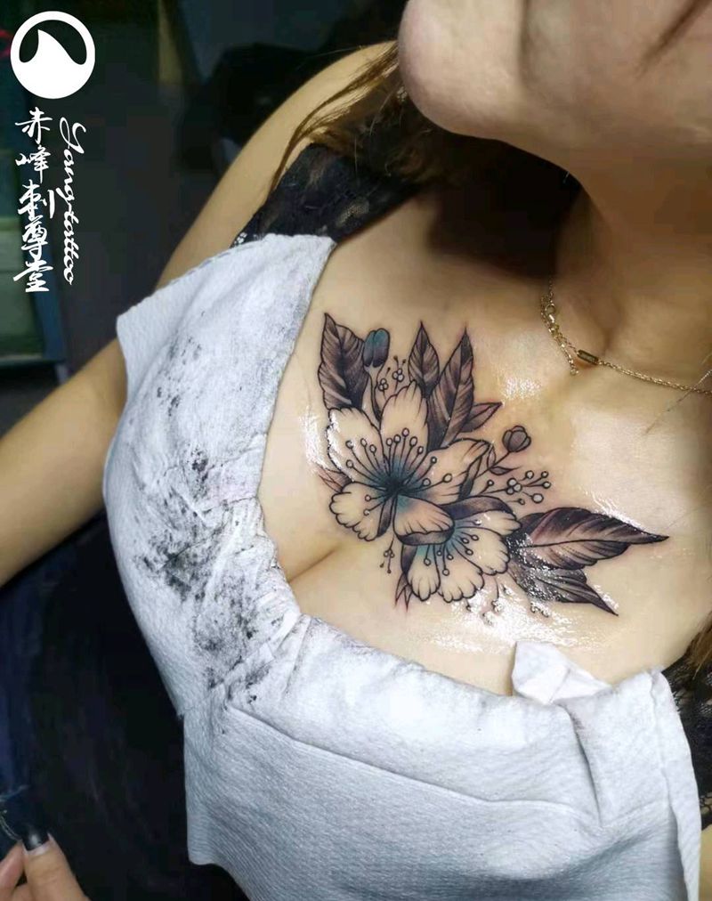 赤峰刺尊堂-花纹身图片_胸部点刺纹身图案