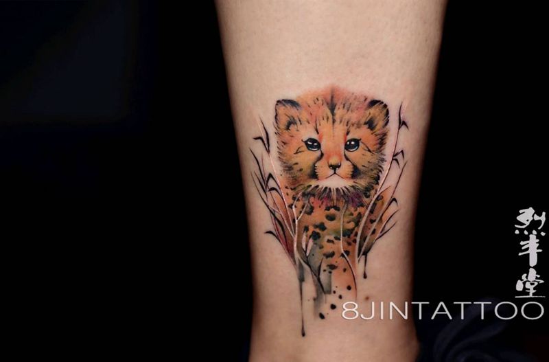 小豹子纹身图片_腿部欧美写实水彩豹子动物包头纹身图案