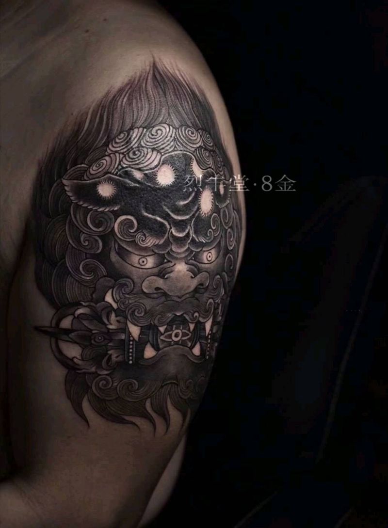 唐狮子纹身图片_手臂肩部新传统老传统唐狮遮盖纹身图案