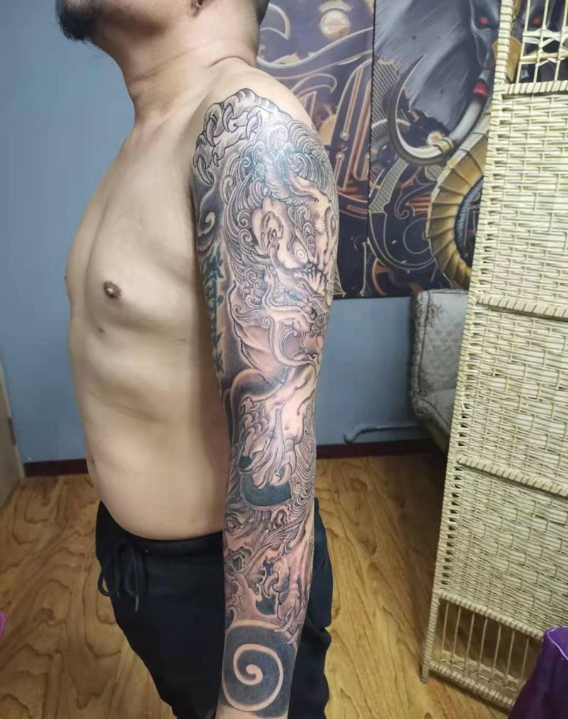 唐狮般若花臂纹身图片_手臂新传统传统花臂纹身图案