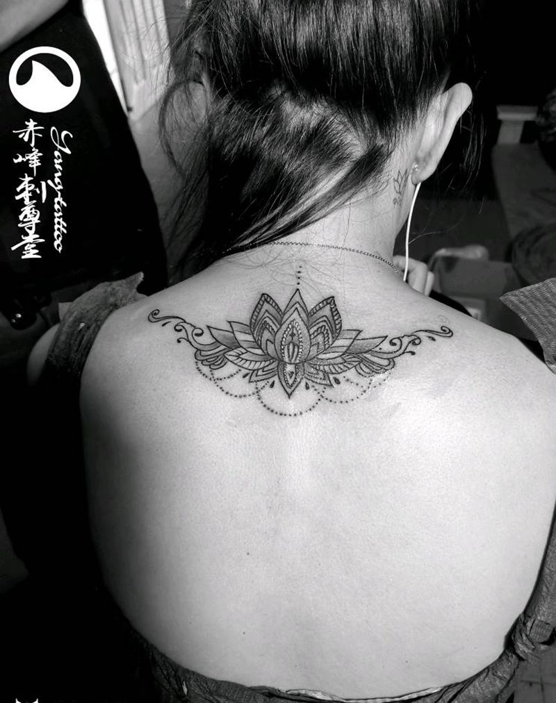 赤峰刺尊堂-花纹身图片_腹部臀部图腾点刺纹身图案