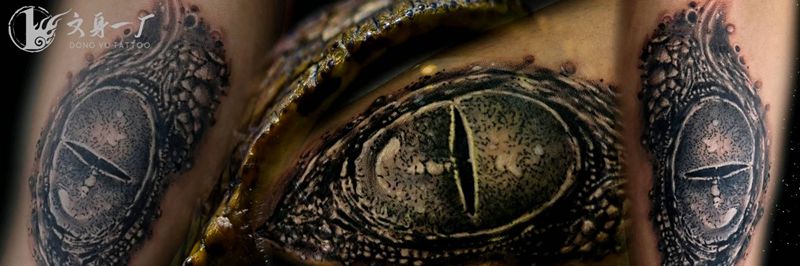 鳄鱼之眼纹身图片_臀部纹身图案