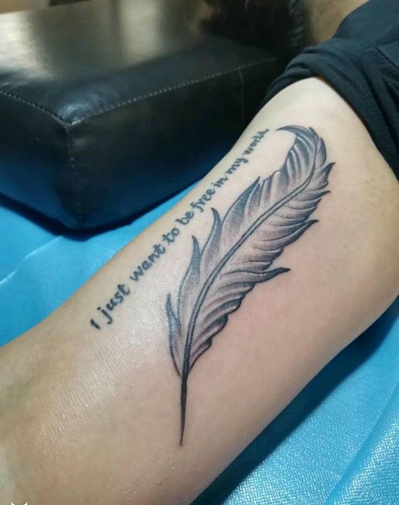 羽毛纹身图片_手臂清新静物成品纹身图案