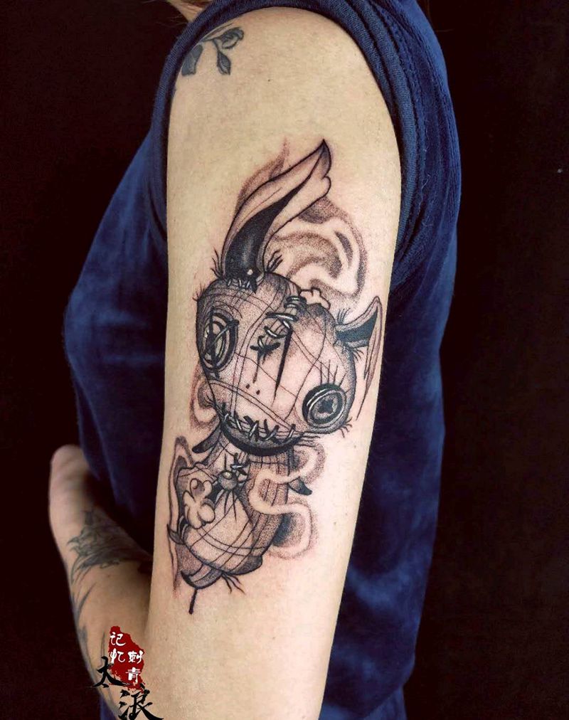 布偶兔子纹身图片_手臂点刺纹身图案