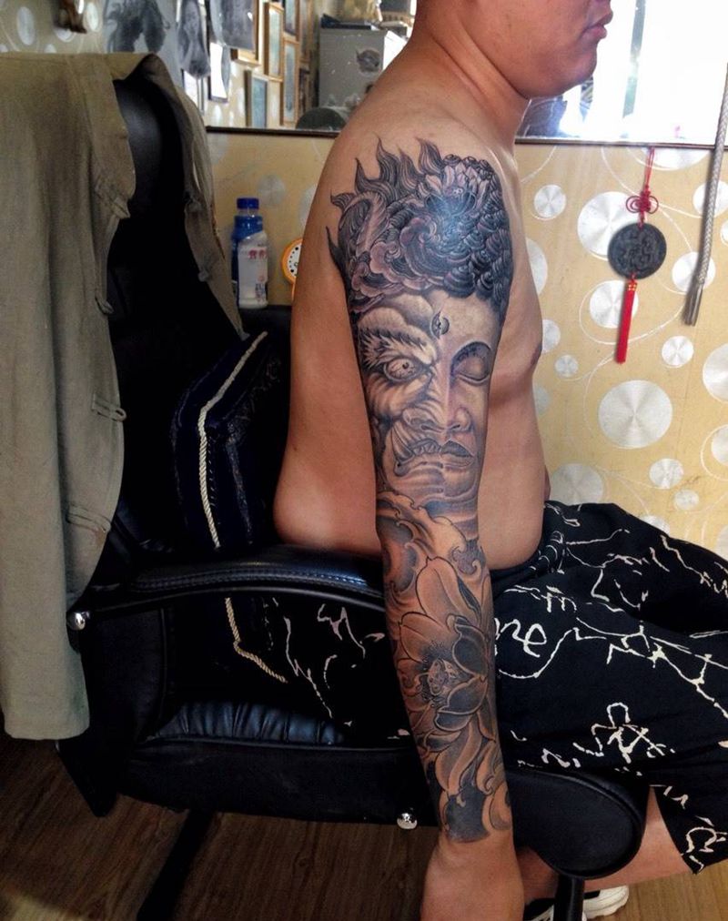 一念之间纹身图片_手稿手臂传统宗教花臂纹身图案