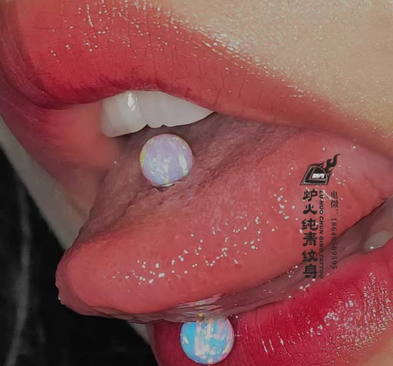 穿孔纹身图片_穿孔纹身图案