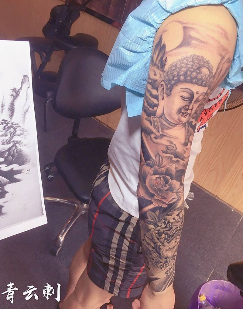 佛 唐狮花臂纹身图片