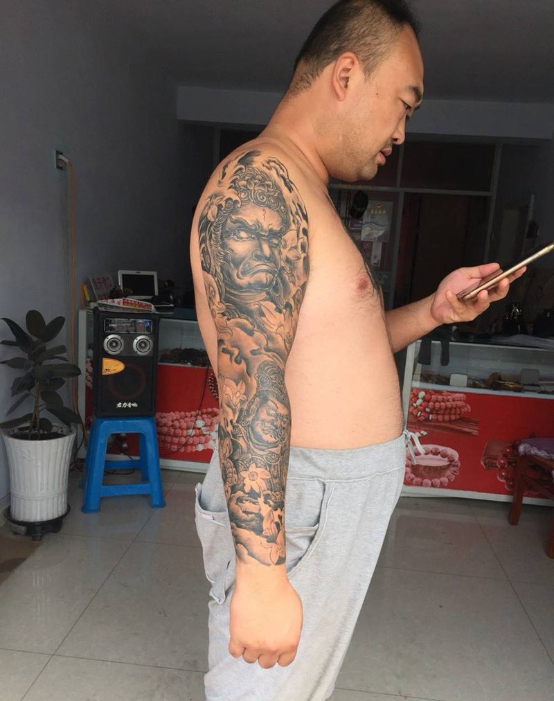 冥王和天王结合的花臂纹身图片