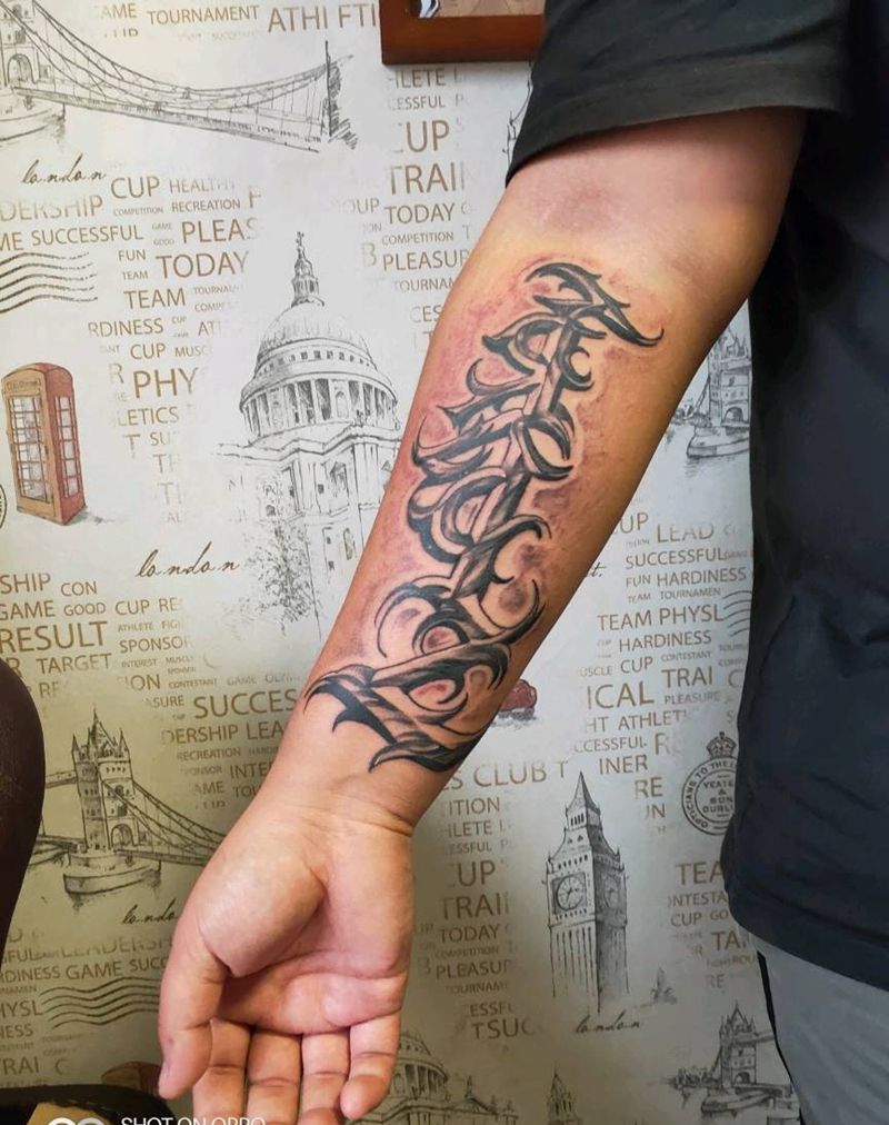 蒙古文鄂尔多斯纹身图片_手臂花体字图腾纹身图案