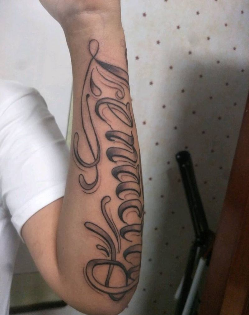 奇卡诺花体纹身图片_手臂花体字纹身图案