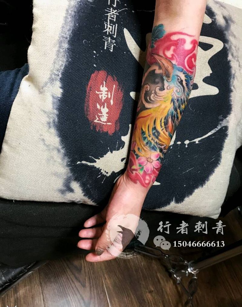 浴火凤凰纹身图片_手臂传统动物成品纹身图案
