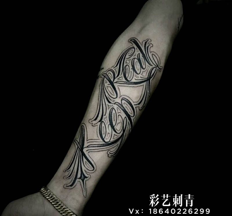手臂花体字纹身图片_手臂几何纹身图案