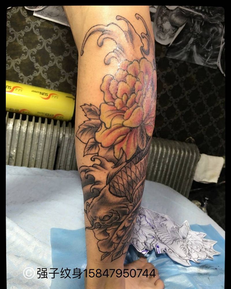 小腿鲤鱼纹身图片