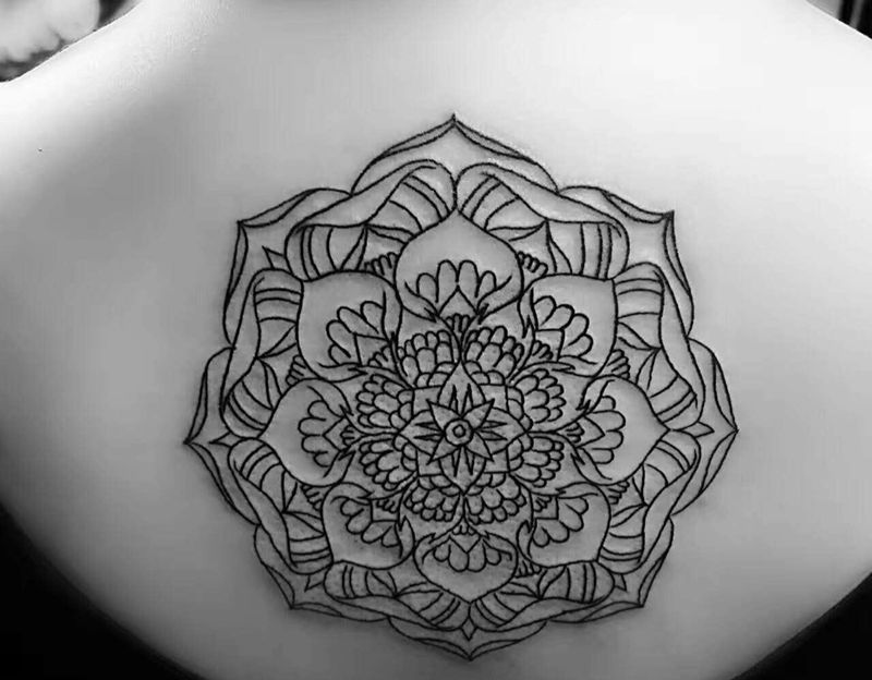 曼海蒂风格纹身图片