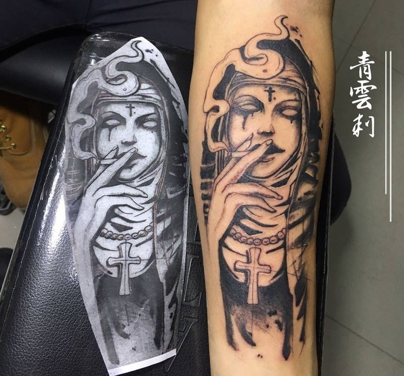 修女纹身图片_手臂纹身图案