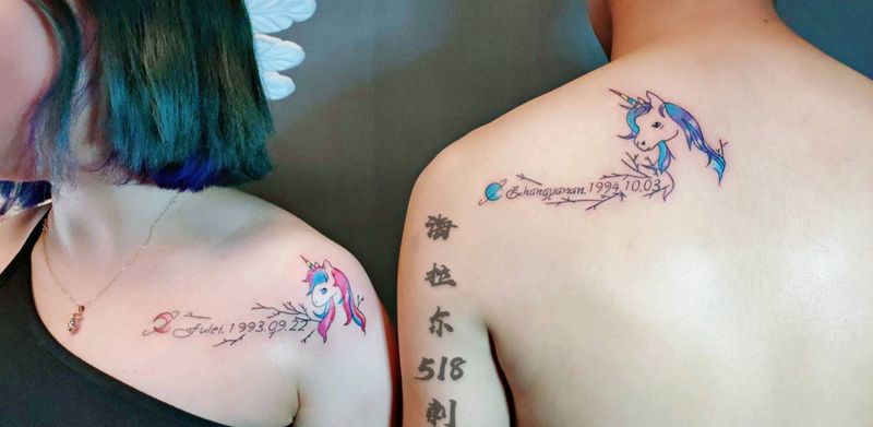 独角兽情侣纹身纹身图片_背部肩部老传统水彩纹身图案