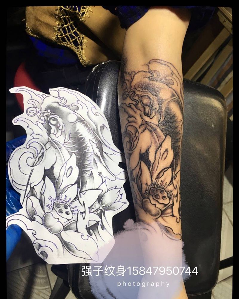 小臂鲤鱼纹身图片