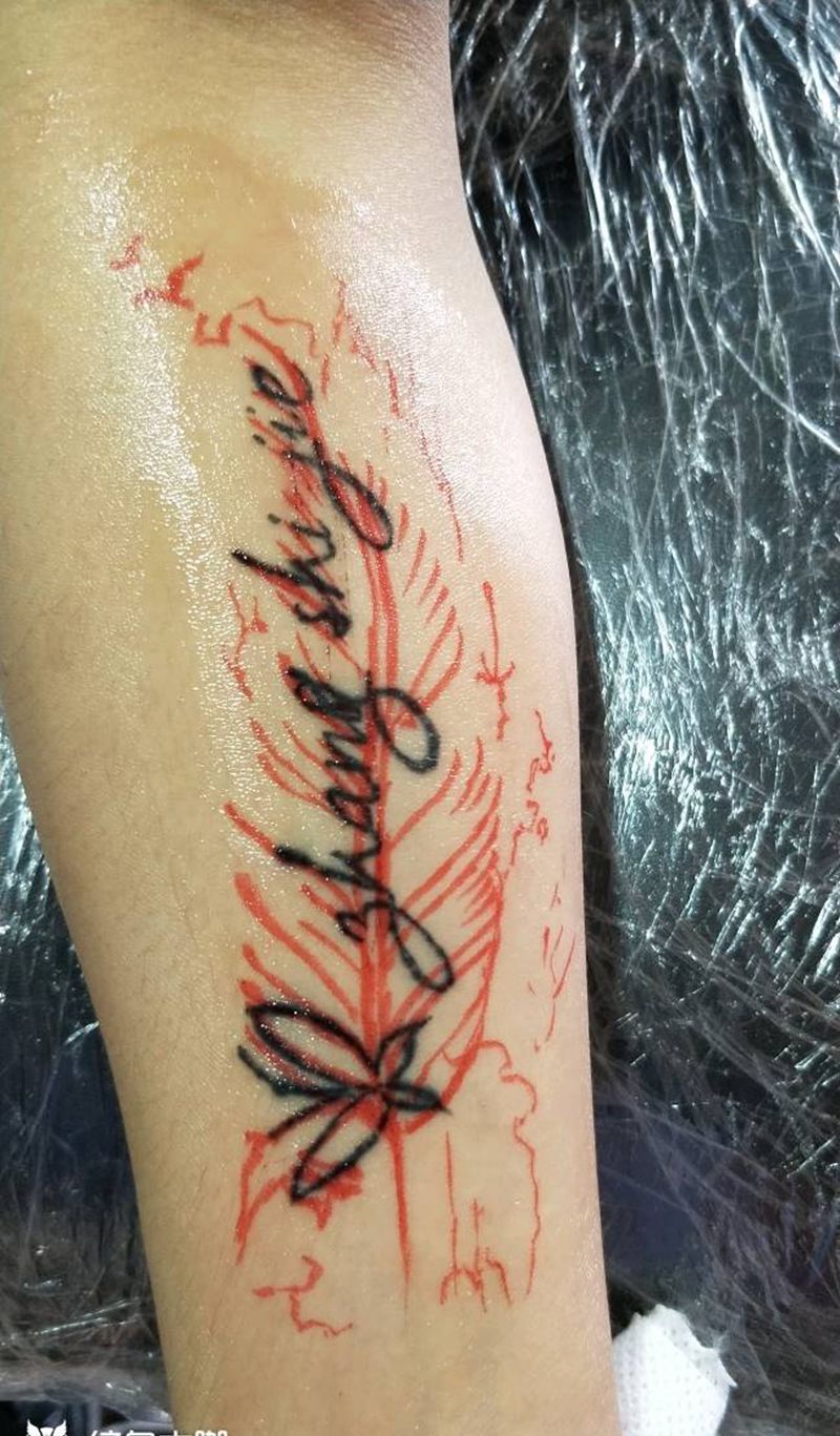 羽毛纹身图片_手臂水彩纹身图案