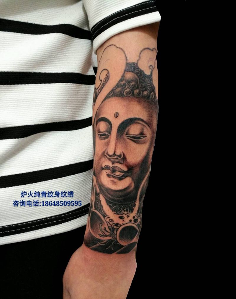 佛首纹身图片