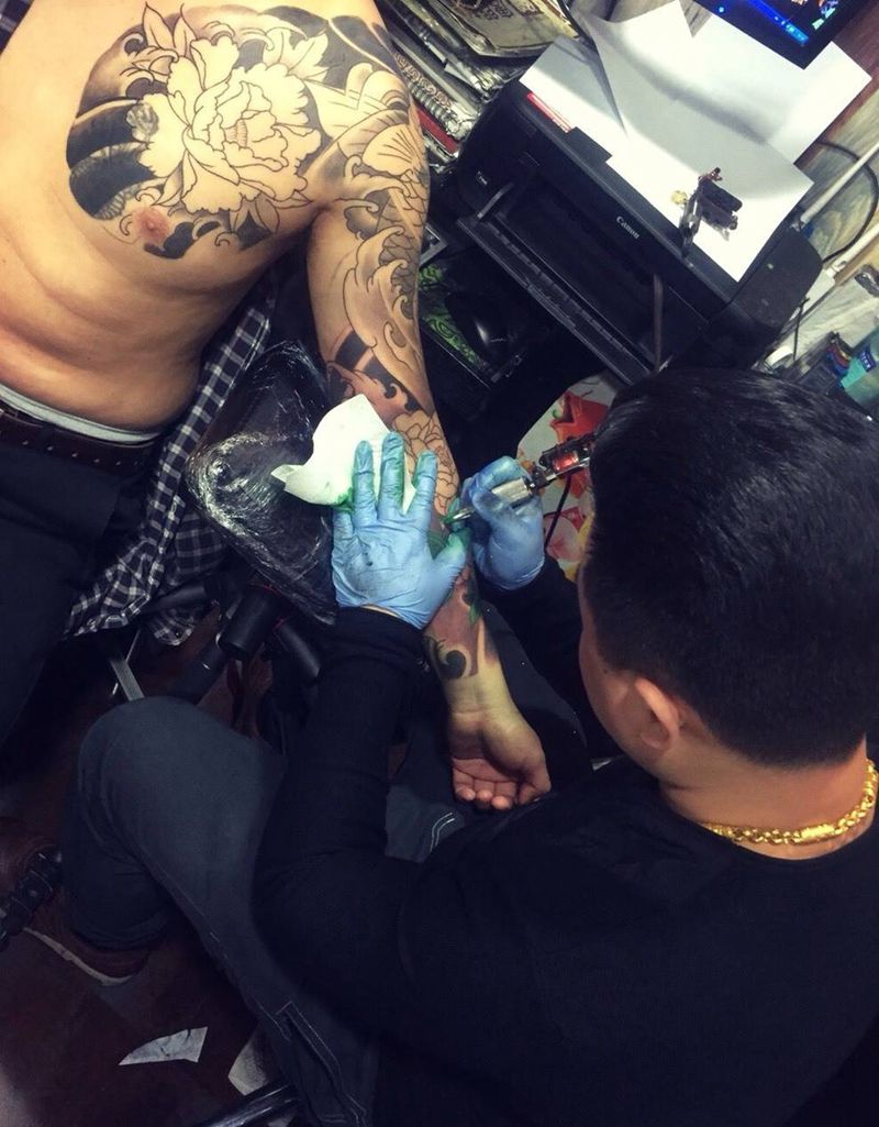 鱼牡丹纹身图片