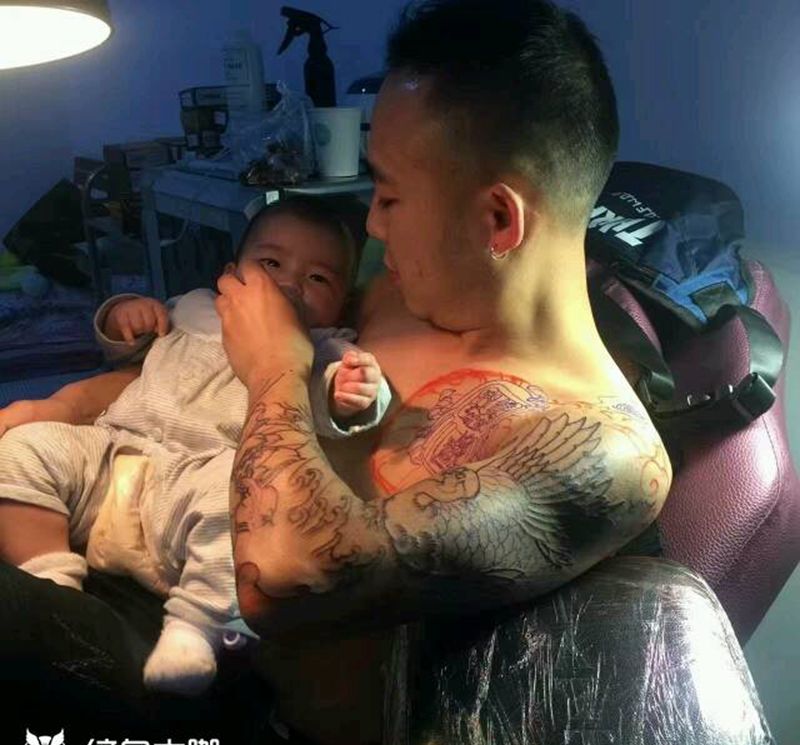 革命尚未成功纹身图片_肩部手臂传统原创成品纹身图案