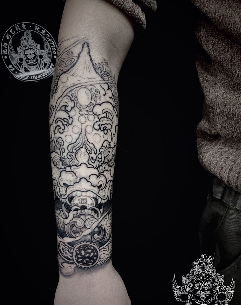 小臂唐狮未完纹身图片_手臂新传统纹身图案