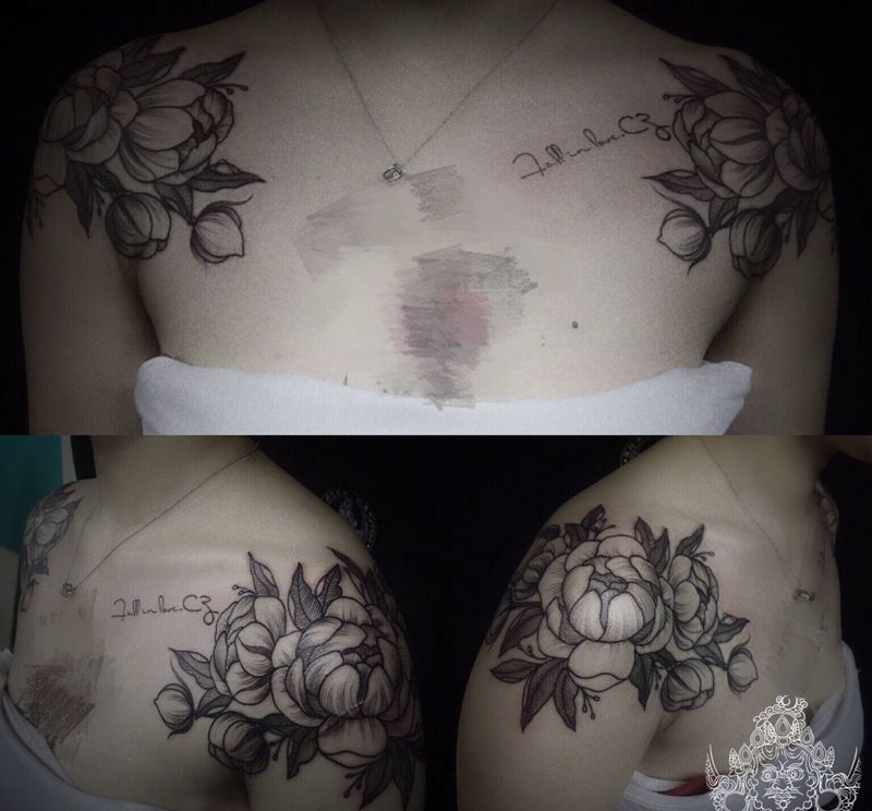 店内肩花纹身图片_肩部点刺纹身图案