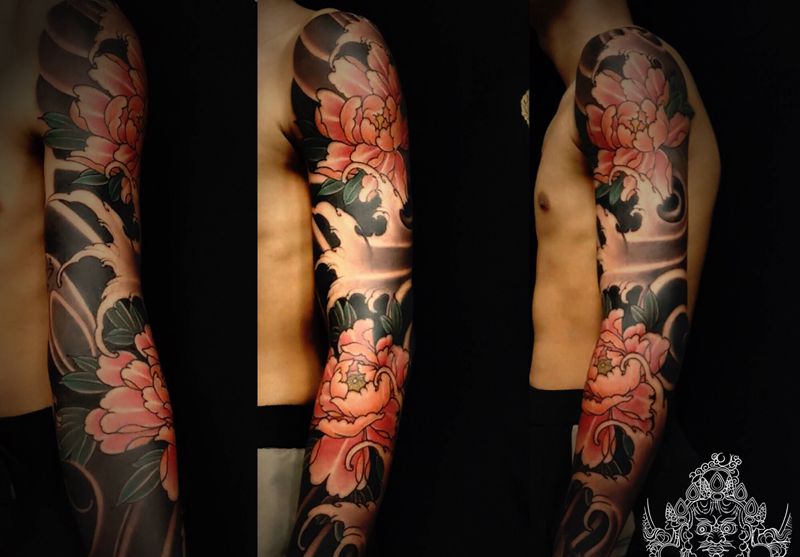 店内作 牡丹花臂纹身图片_手臂新传统纹身图案