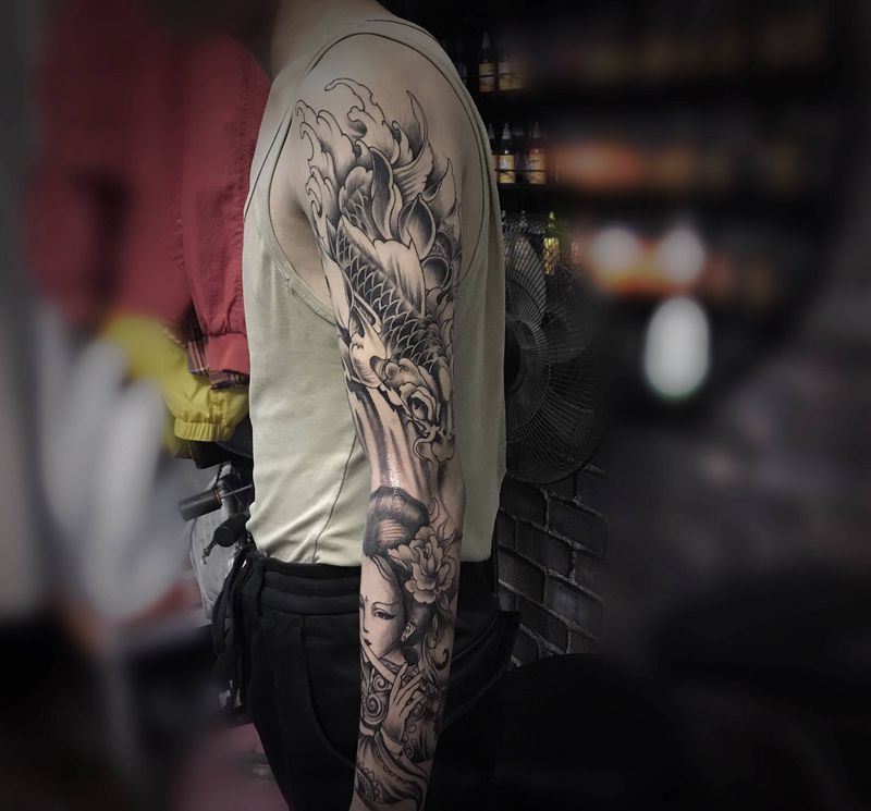 未完纹身图片_手臂老传统纹身图案