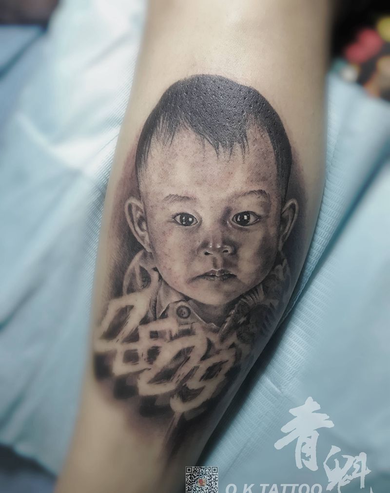 肖像纹身纹身图片_腿部欧美写实纹身图案