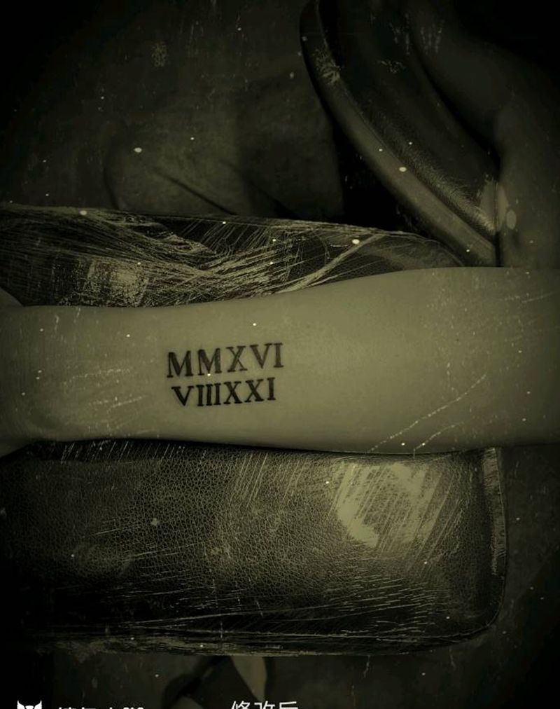 字母纹身图片_手臂花体字纹身图案