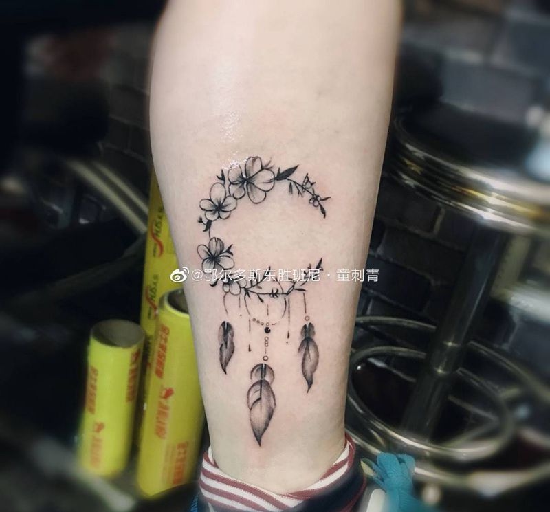 捕梦网纹身图片