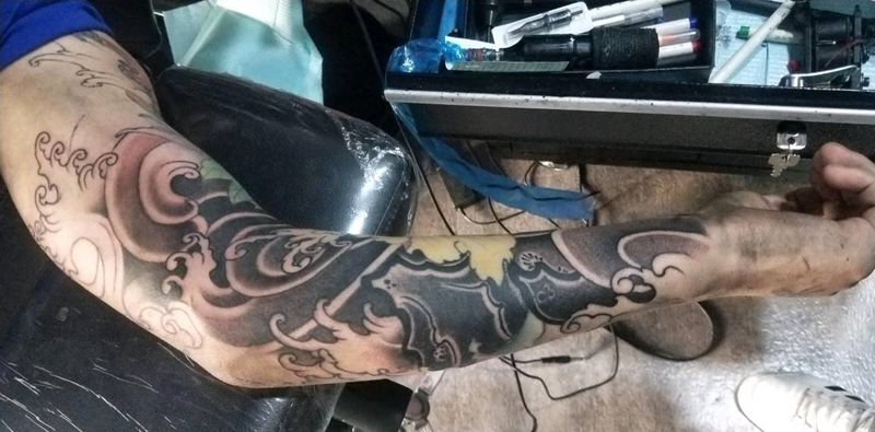 浪花纹身图片_手臂老传统纹身图案