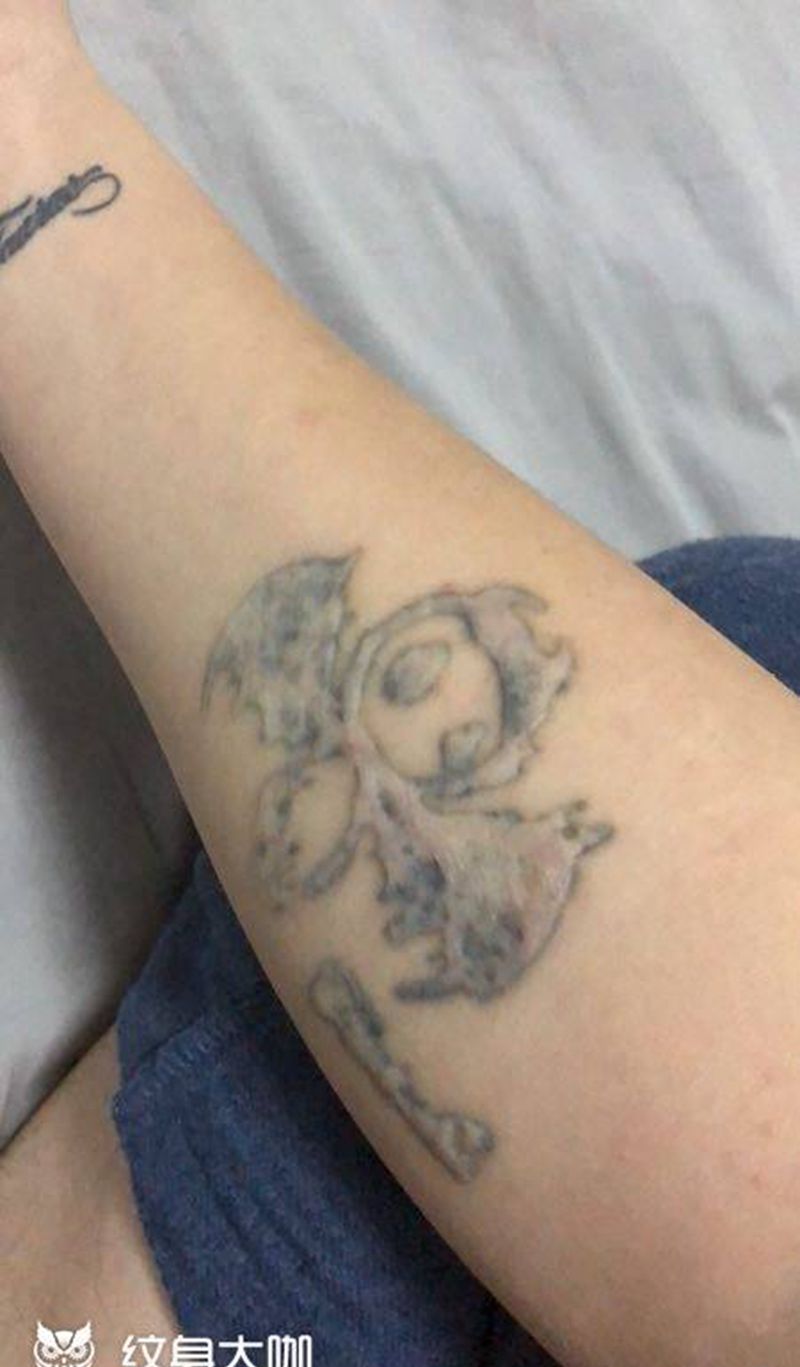 骷髅遮盖纹身图片