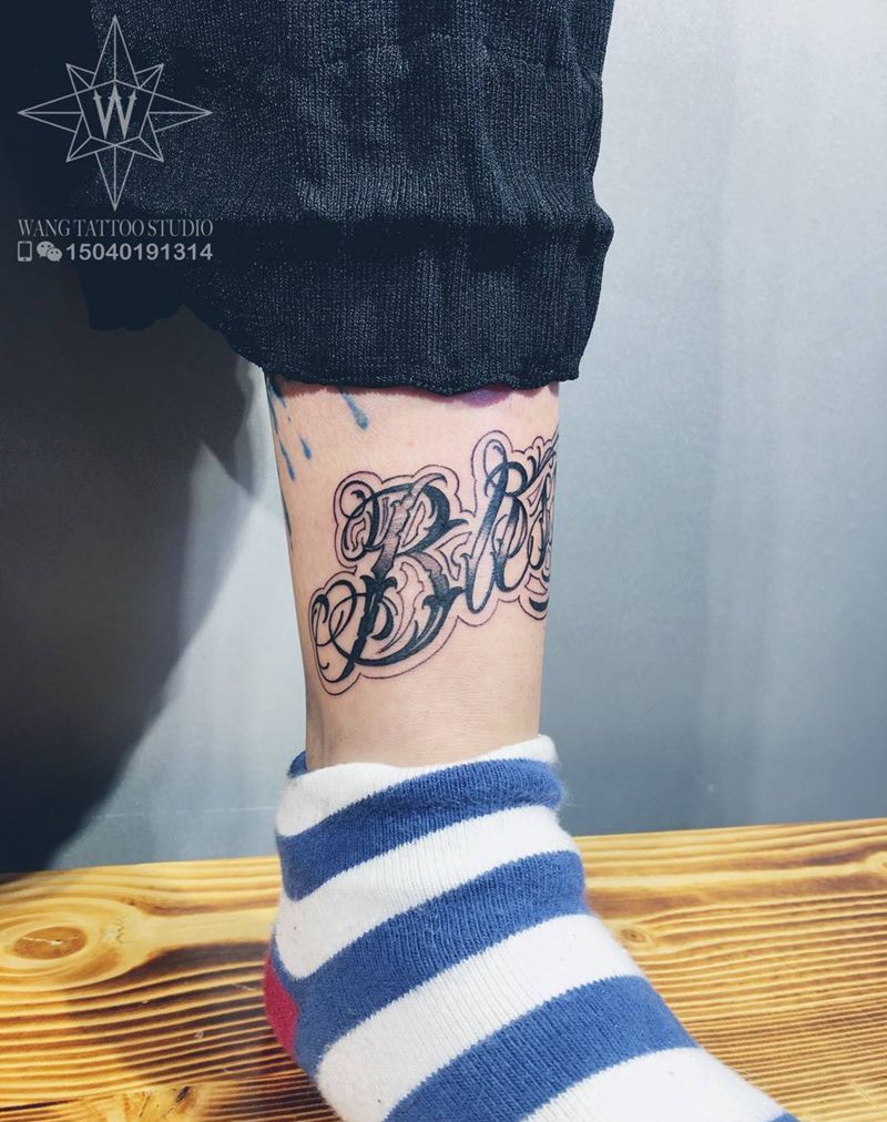 花体字纹身图片_成品腿部欧美字符纹身图案