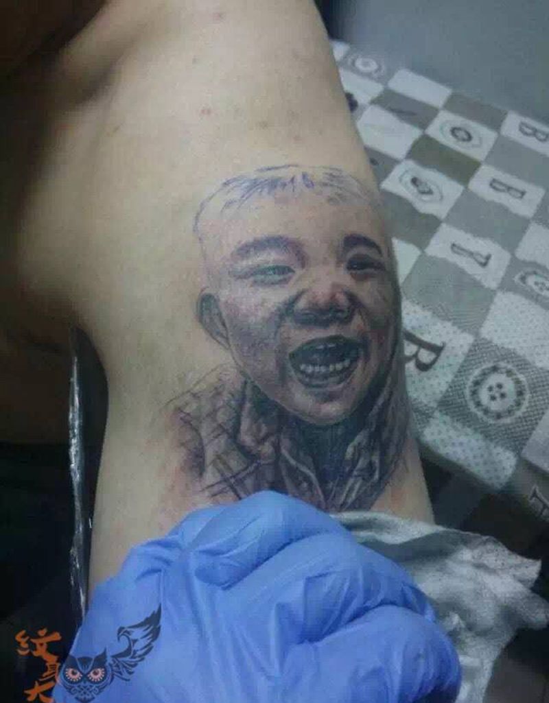 父爱深沉纹身图片