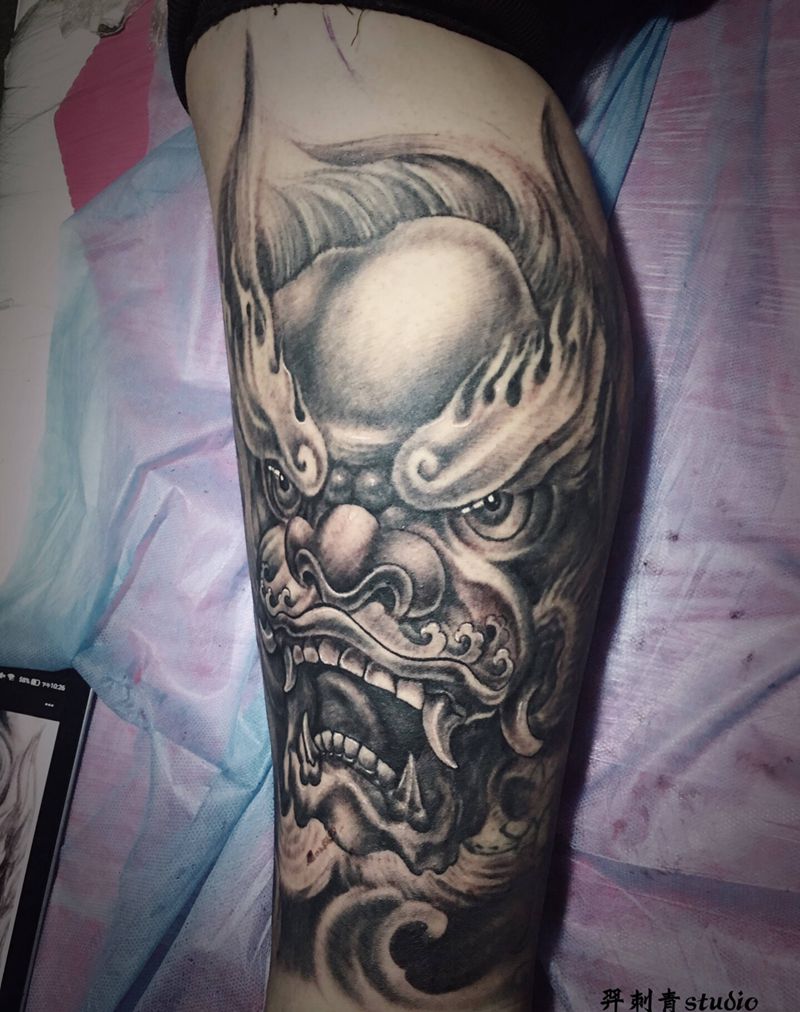 唐狮子纹身图片_腿部新传统纹身图案