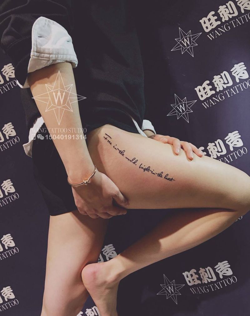 Free in the world纹身图片_成品腿部欧美字符清新纹身图案