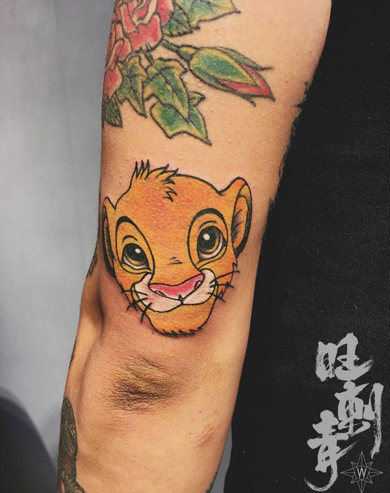 狮子王辛巴纹身图片_成品手臂欧美动物纹身图案