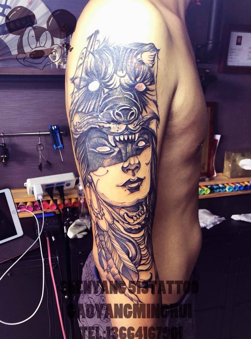 遮盖作品纹身图片_手臂点刺人物狼羽毛纹身图案