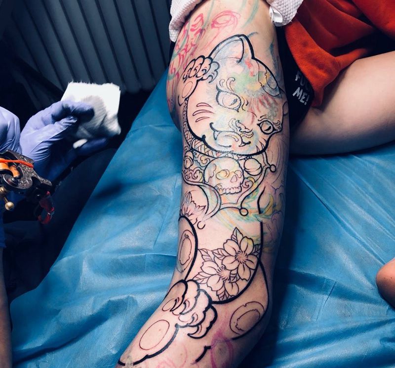 一条好腿纹身图片_小伟刺青动物腿部传统纹身图案