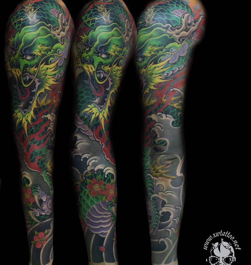 龙臂纹身图片_手臂新传统小伟刺青纹身图案