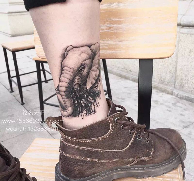 象，长寿、财富、力量的象征。纹身图片_成品脚部写实动物原创纹身图案