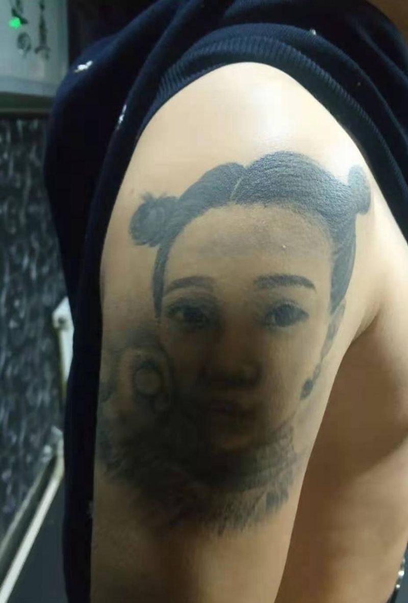 老传统花臂遮盖纹身图片_手臂老传统纹身图案